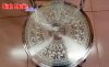 Mặt ghế khắc hoa văn trống đồng Ngọc Lũ của  cơ sở Long Tùng đang được sử dụng tại chùa Quang Minh